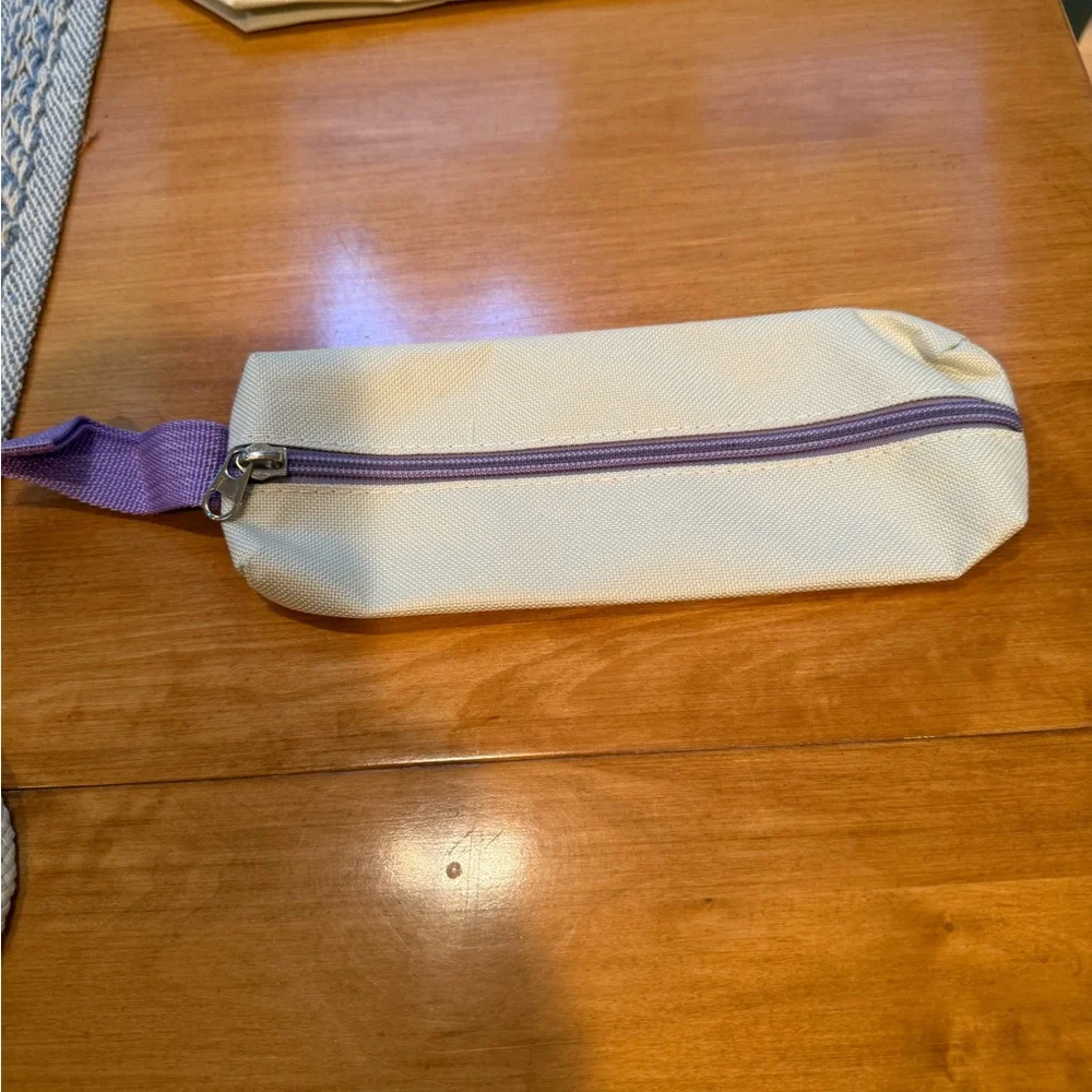 Cream Backpack with Purple Accents and Plush Keychain
